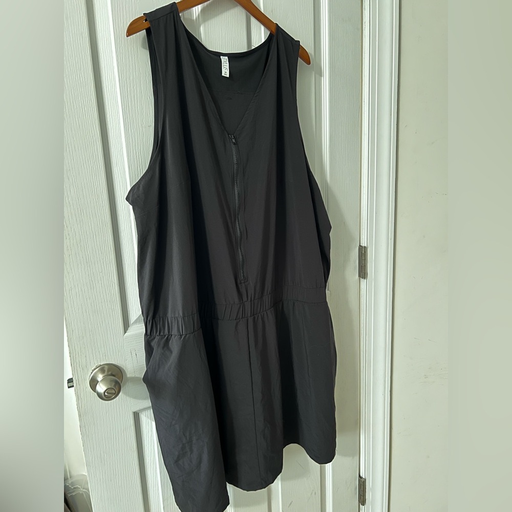 NWT Stylus Black Sleeveless romper with shorts underneath and pockets.